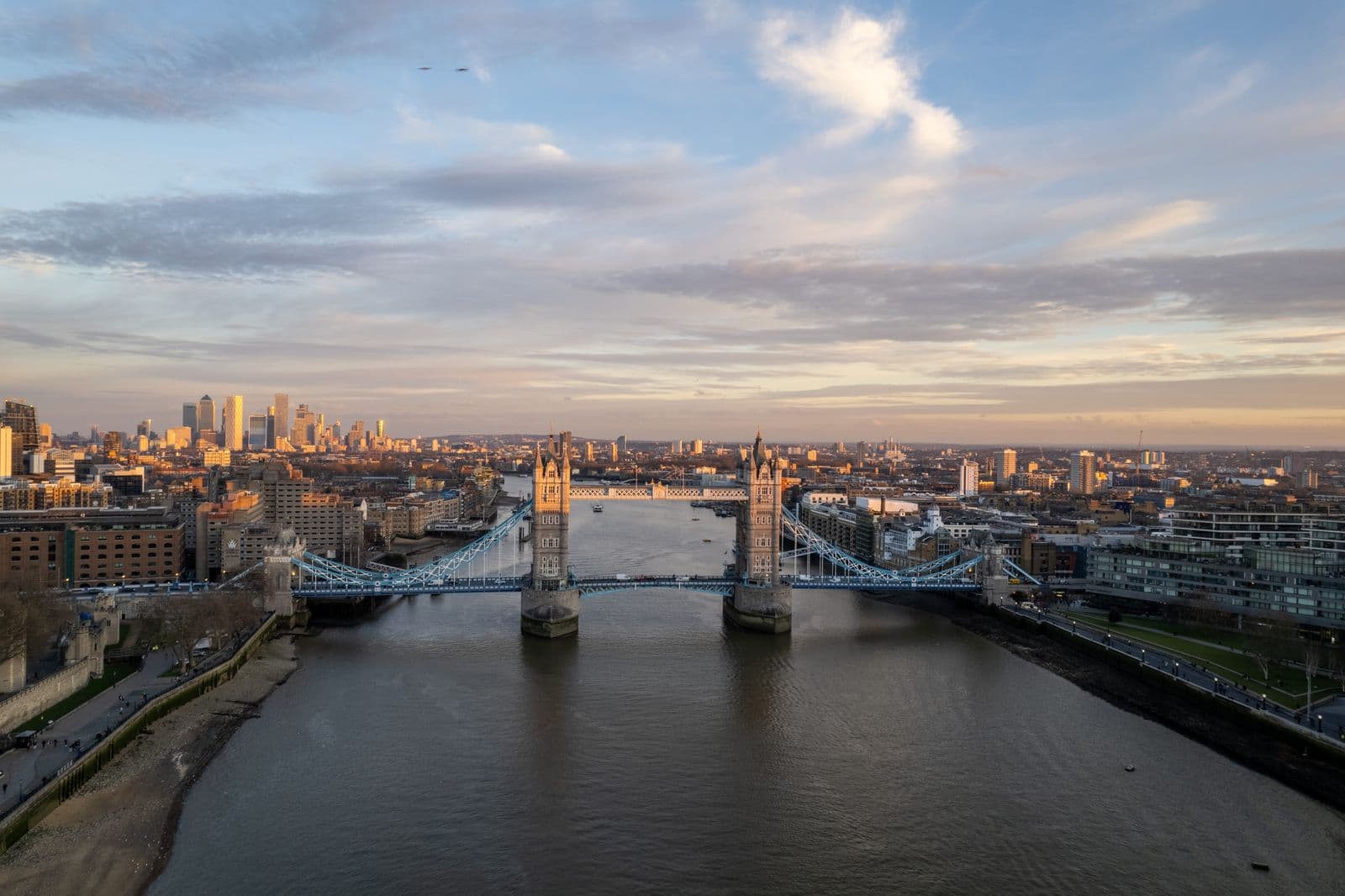 Aerial view of a bridge over the Thames at dusk