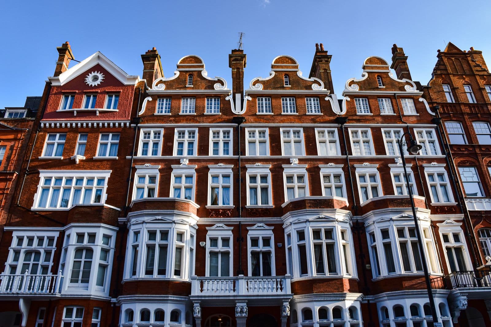 Victorian red brick building with ornate windows