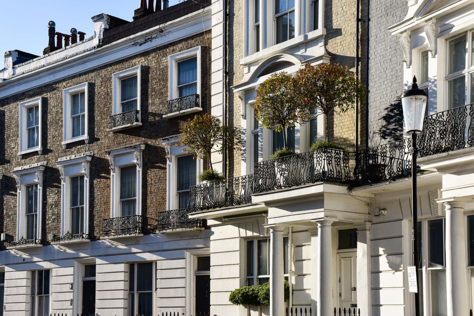 Row of townhouses with iron balconies